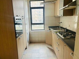 Kitchen in 3 BHK Apartment at Unitech Fresco, Sector 50 – for Sale