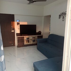 Living Room in 2 BHK Apartment at Kwality Mrudang Residency, Tathawade – for Rent