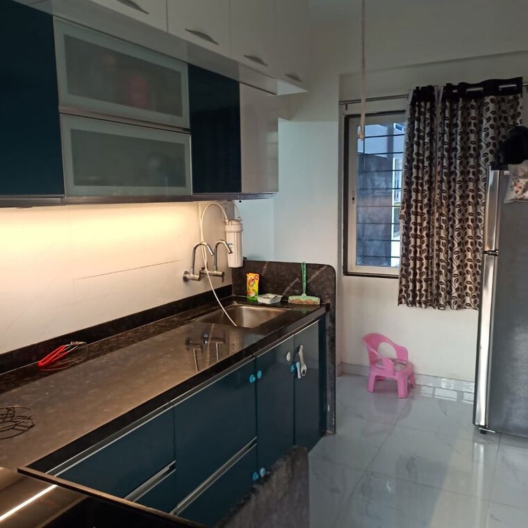 Kitchen, kwality-mrudang-residency 2 Bedroom 653 Sq.Ft. Apartment In Tathawade Pune 10150076