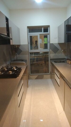 Kitchen in 3 BHK Builder Floor at Shreeji Sky Rise, Kandivali West – for Sale