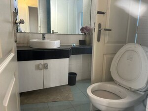 Bathroom in 3 BHK Apartment at Vatika City, Sector 49 – for Sale