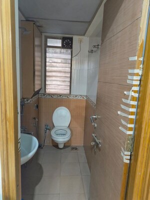 Bathroom in 3 BHK Apartment at Riddhi Tower, Malad East – for Rent