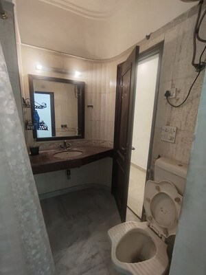 Bathroom in 2 BHK Builder Floor at Green Park – for Rent