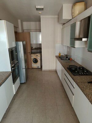 Kitchen in 4 BHK Apartment at DLF New Town Heights I, Sector 90 – for Rent
