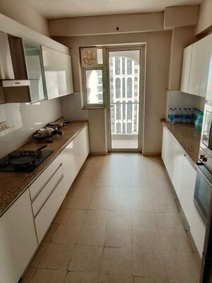 Kitchen in 4 BHK Apartment at DLF New Town Heights I, Sector 90 – for Rent