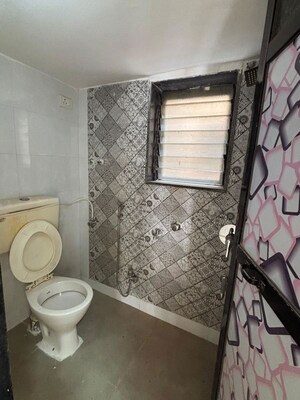 Bathroom in 2 BHK Apartment at Aparna Society, Dombivli West – for Rent