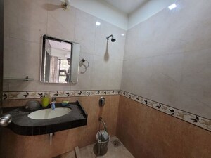 Bathroom in 2 BHK Apartment at Sunteck City Avenue 4, Goregaon West – for Rent