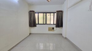 Bedroom in 2 BHK Apartment at Atlanta CHS, Malad West – for Rent
