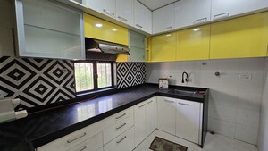 Kitchen in 2 BHK Apartment at Atlanta CHS, Malad West – for Rent