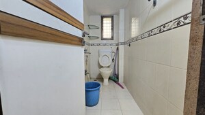 Bathroom in 2 BHK Apartment at Atlanta CHS, Malad West – for Rent