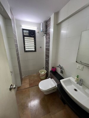 Bathroom in 2 BHK Apartment at Tilak Nagar – for Rent