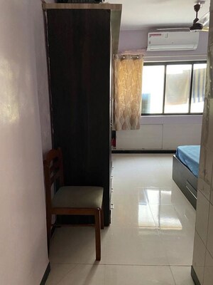Living Room in 2 BHK Apartment at Khimawat Bhavan CHS, Andheri East – for Rent