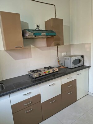 Kitchen in 1 BHK Apartment at Puranik City, Kasarvadavali – for Rent