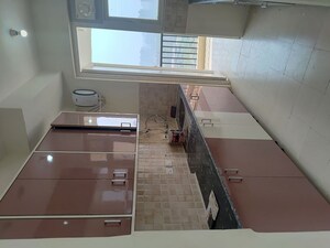 Kitchen in 3 BHK Apartment at Amrapali Heartbeat City, Sector 107 – for Rent