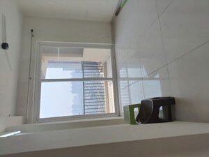 Kitchen in 3 BHK Apartment at Amrapali Heartbeat City, Sector 107 – for Rent