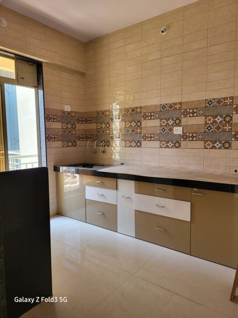 Kitchen, godrej-emerald 2 Bedroom 815 Sq.Ft. Apartment In Ghodbunder Road Thane 10150910