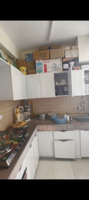 Kitchen in 3 BHK Apartment at MGI Gharaunda, Raj Nagar Extension – for Sale