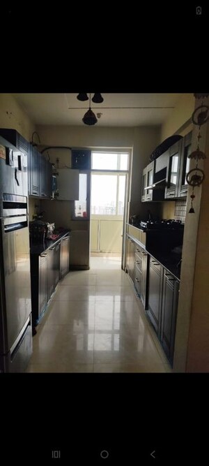 Kitchen in 4 BHK Apartment at Prateek Wisteria, Sector 77 – for Rent