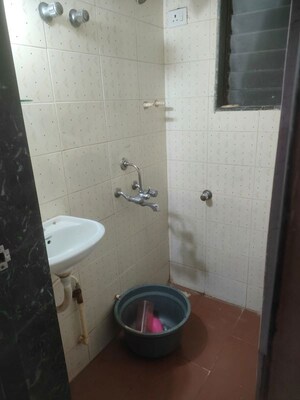 Bathroom in 1 RK Apartment at Sanjay Gandhi Nagar CHS, Malad East – for Rent