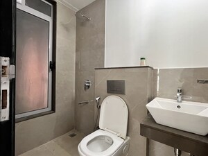 Bathroom in 1.5 BHK Apartment at Piramal Revanta, Mulund West – for Rent