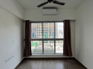 Living Room in 1.5 BHK Apartment at Piramal Revanta, Mulund West – for Rent