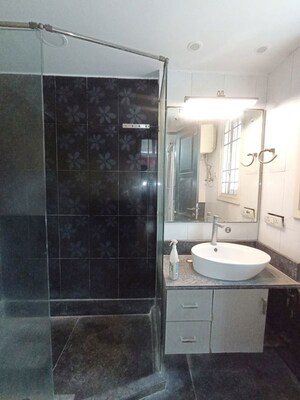 Bathroom in 3 BHK Builder Floor at Pamposh Enclave – for Rent