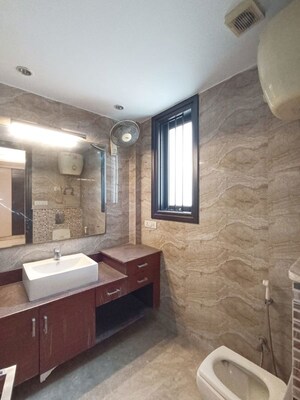 Bathroom in 3 BHK Builder Floor at Pamposh Enclave – for Rent