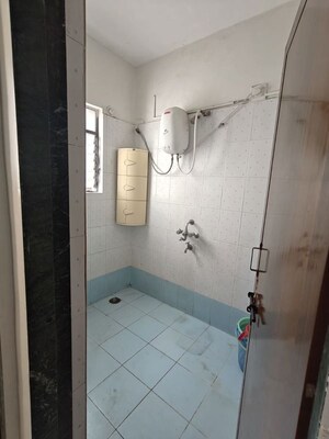 Bathroom in 3 BHK Apartment at Saudamini CHS, Kothrud – for Rent