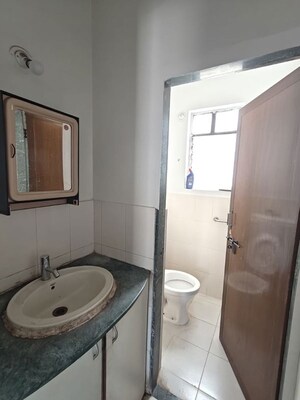 Bathroom in 3 BHK Apartment at Saudamini CHS, Kothrud – for Rent