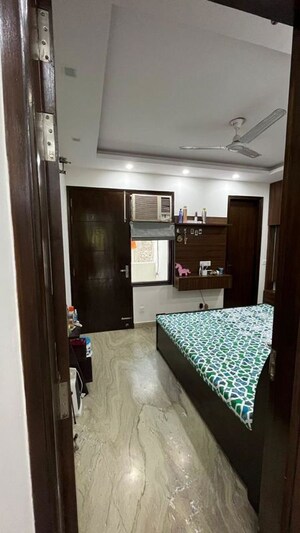 Bedroom in 2 BHK Builder Floor at Kalkaji – for Rent