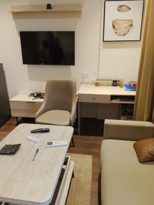 Living Room in Studio Apartment at Satya The Hive, Sector 102 – for Sale