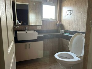 Bathroom in 3 BHK Apartment at Vatika City, Sector 49 – for Sale
