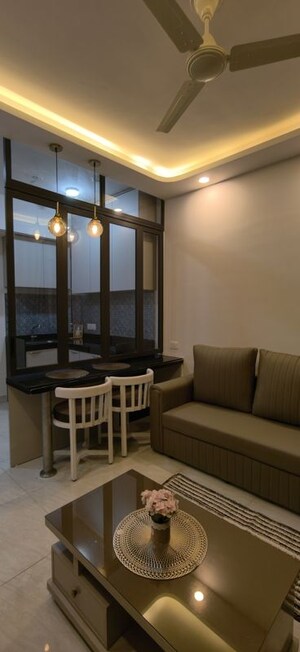 Living Room in 1 BHK Apartment at Lodha Crown Quality Homes, Majiwada – for Rent