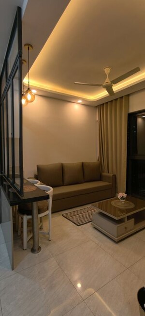 Living Room in 1 BHK Apartment at Lodha Crown Quality Homes, Majiwada – for Rent