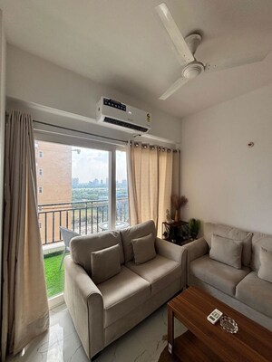 Living Room in 2 BHK Apartment at Jaypee Green The Star Court, Jaypee Greens – for Rent