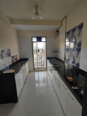 Kitchen in 2 BHK Apartment at Solitaire Heights, Malad West – for Rent