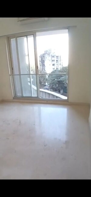 Bedroom in 2 BHK Apartment at Ekta Tripolis, Goregaon West – for Rent