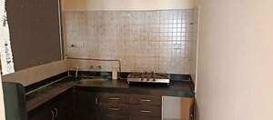 Kitchen in 1 BHK Apartment at Sancheti  Belcastel, Mundhwa – for Rent