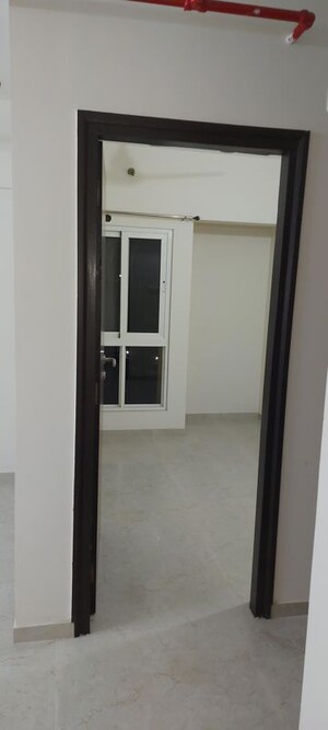 Building Lobby in 2 BHK Apartment at Dosti West County, Balkum Pada – for Rent