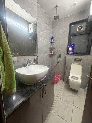 Bathroom in 3 BHK Builder Floor at Denso Apartments, Sector M1b – for Rent