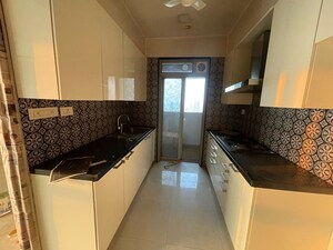 Kitchen in 2 BHK Apartment at Gandhi Nagar CHS, Worli – for Sale