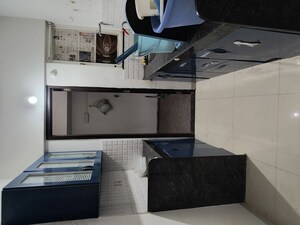 Kitchen in 2 BHK Apartment at Majestique Magnum, Pisoli – for Sale