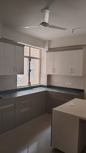 Kitchen in 2 BHK Apartment at Breez Global Heights, Sohna Sector 33 – for Rent