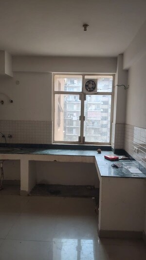 Kitchen in 2 BHK Apartment at Breez Global Heights, Sohna Sector 33 – for Rent
