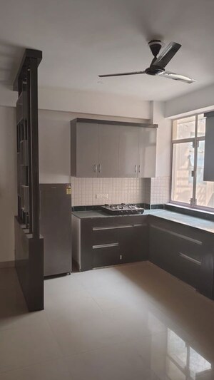 Kitchen in 2 BHK Apartment at Breez Global Heights, Sohna Sector 33 – for Rent