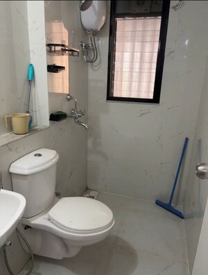 Bathroom in 1 BHK Apartment at Runwal Gardens Phase 2, Dombivli East – for Rent