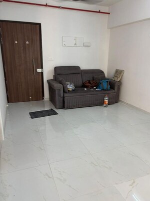 Living Room in 1 BHK Apartment at Runwal Gardens Phase 2, Dombivli East – for Rent