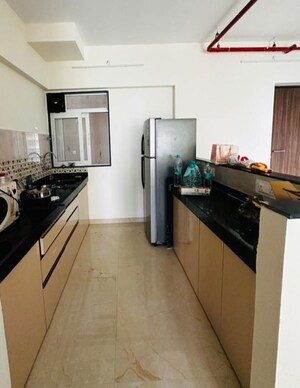Kitchen in 2 BHK Apartment at Raunak Paradise, Kokanipada – for Rent