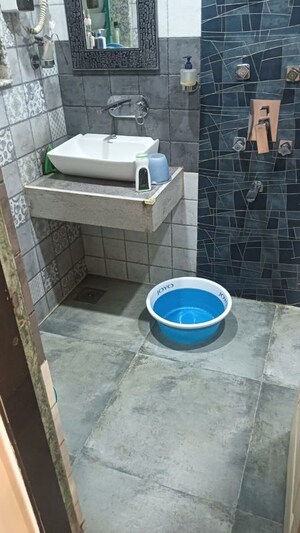 Bathroom in 2 BHK Apartment at Nilgiri C Wing CHS, Andheri East – for Rent