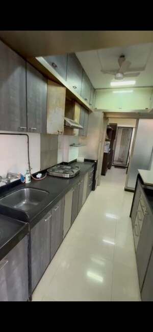 Kitchen in 3 BHK Apartment at Anmol Towers, Goregaon West – for Sale